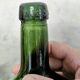 Oval green demijohn