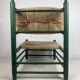Fauteuil bas en paille de jonc français dans le style de Charles Dudouyt, années 1950