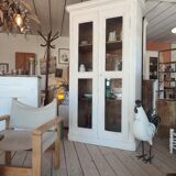 Patinated white bookcase