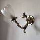 Bronze wall light with opaque glass tulip 1900