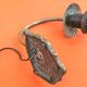 Patinated brass wall light with tulip shade