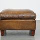 Sheepskin wing chair + XXL patinated footrest