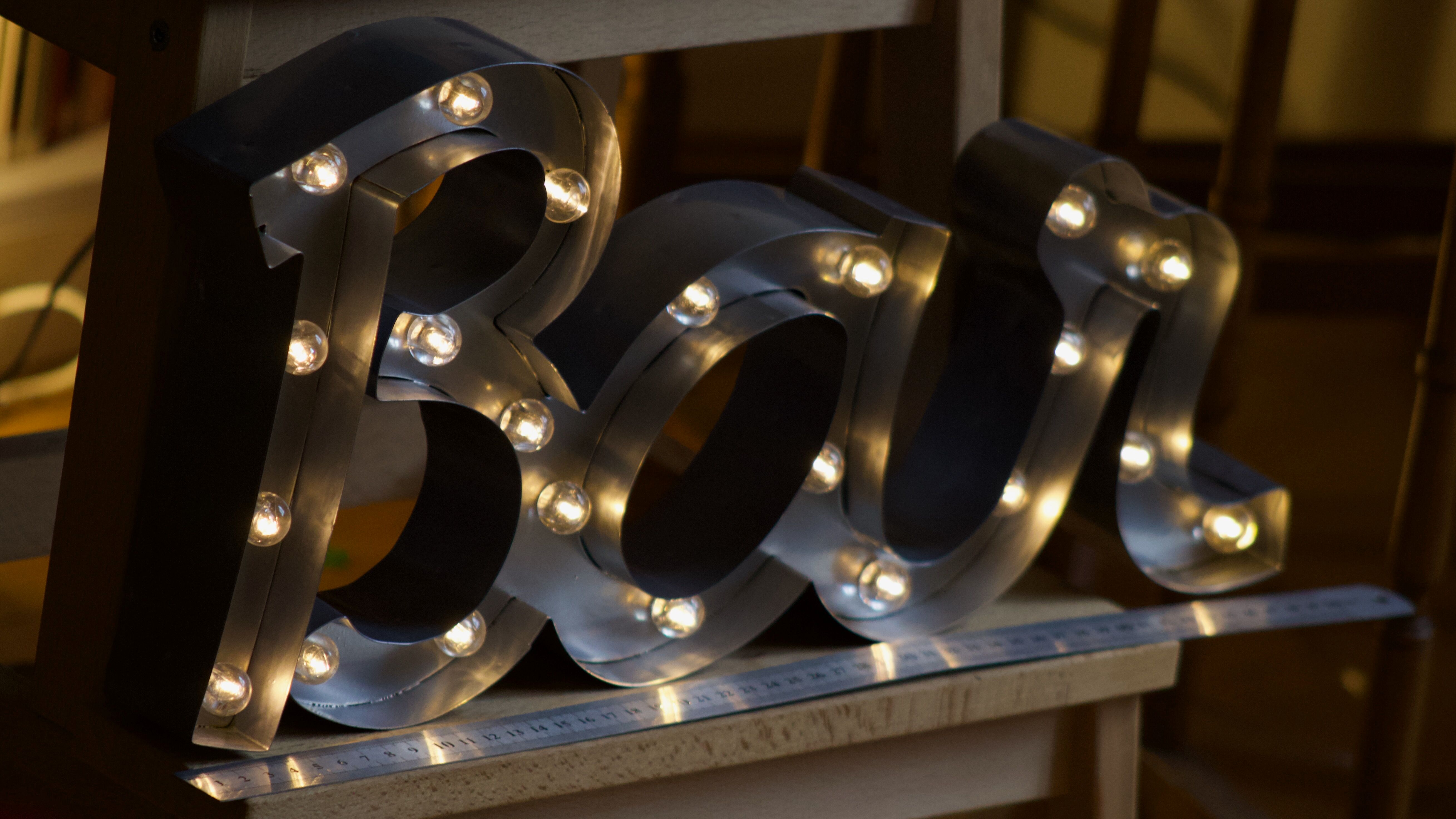 Ancient Light Sign in aluminium lettering forming the word "BAR"