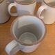 Six ceramic mugs
