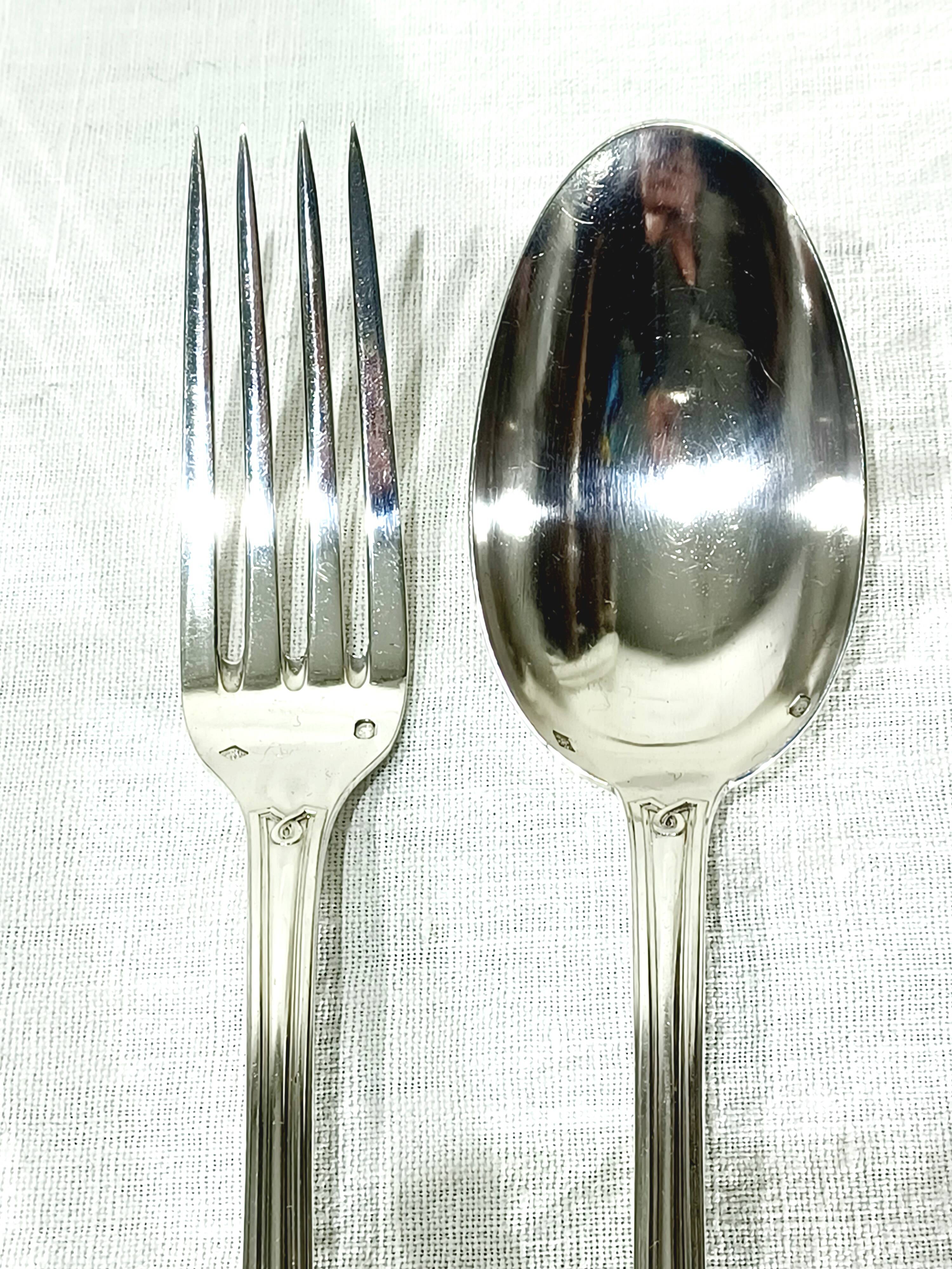 12 Louis XIV style silver cutlery sets