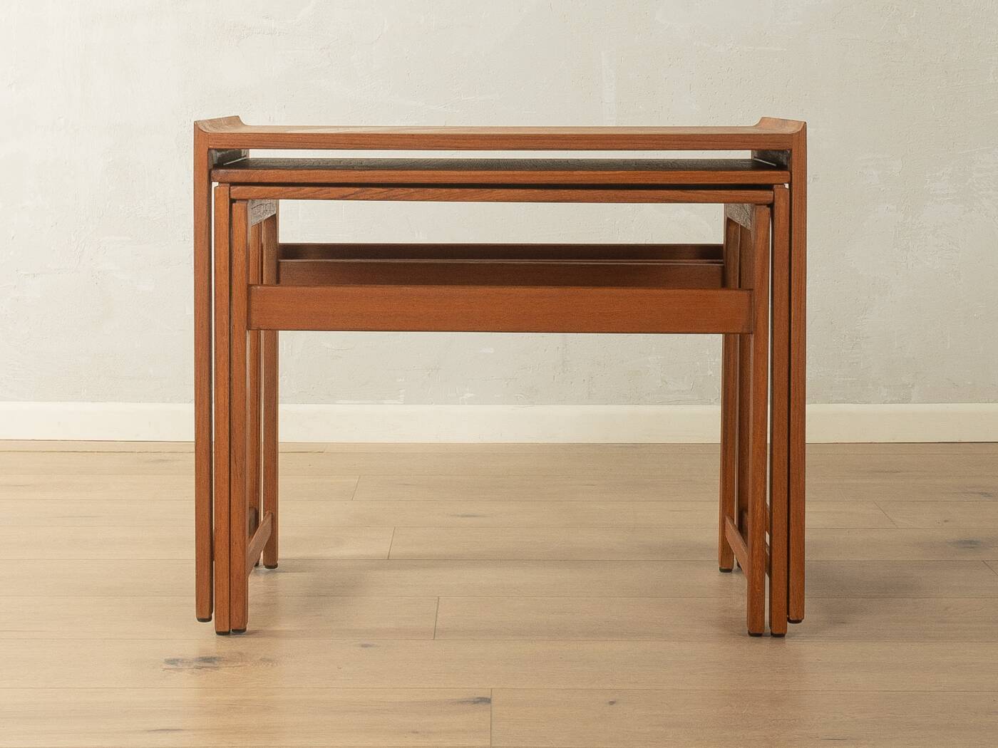 Elegant set of three nesting tables made of teak