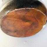 Metallic brown ceramic torso vase