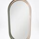 Oval mirror in white lacquer from the 1970s.