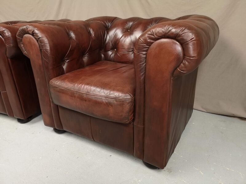 Brown brown leather chesterfield armchairs