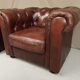 Brown brown leather chesterfield armchairs