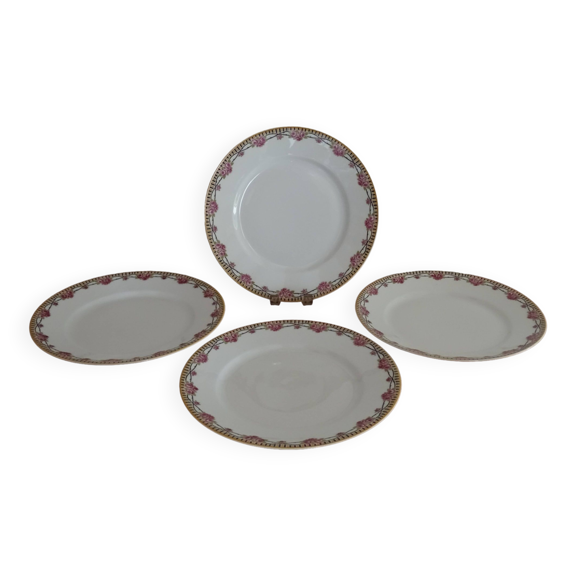 4 assiettes plates porcelaine Limoges Theodore Haviland motifs Art Deco Ø 24, cm