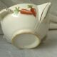 Sauceboat in earthenware decorated with four seasons vegetables.