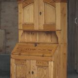 Old Danish secretary in pine with drop-down front and upper cabinet, mid-19th century.