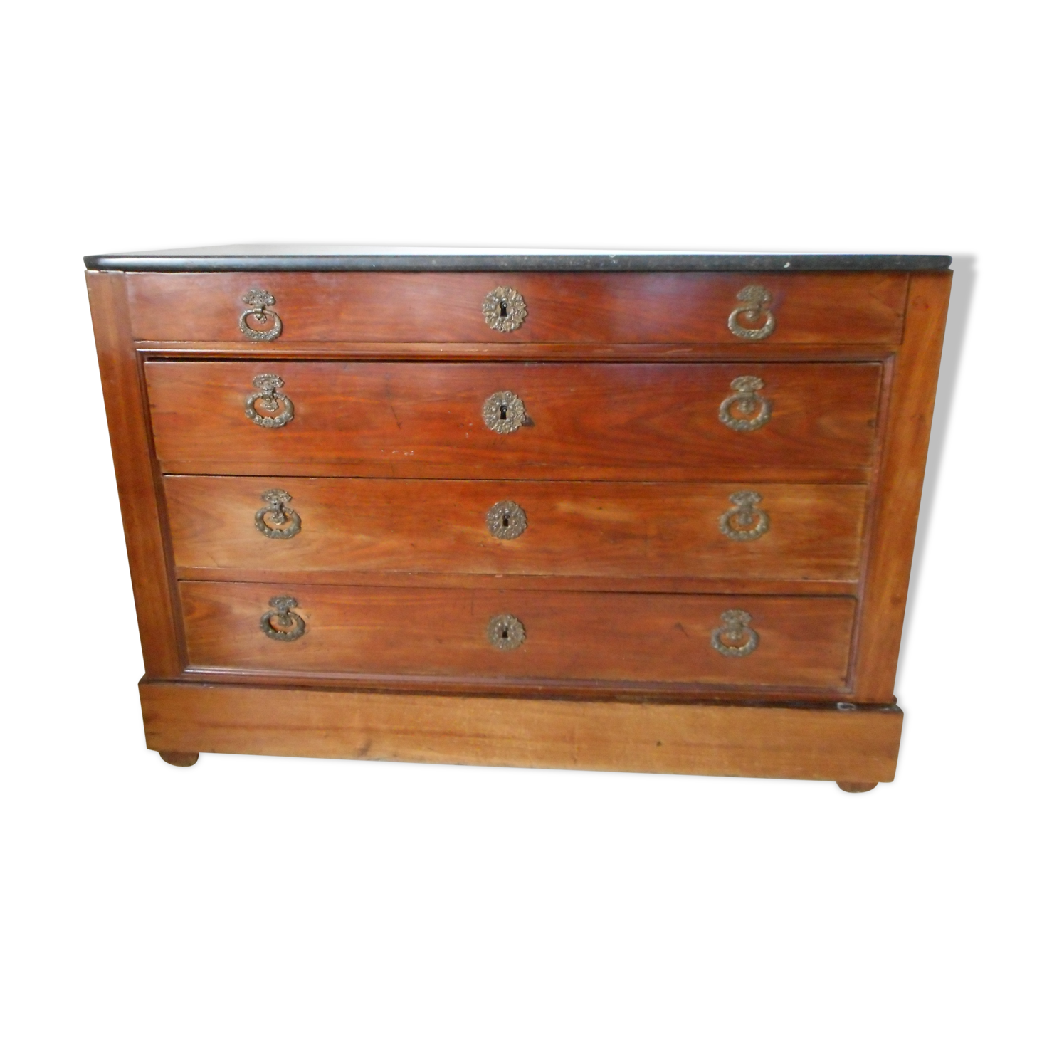 Old chest of drawers with black marble