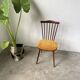 Baumann “Minuet” chair with yellow seat