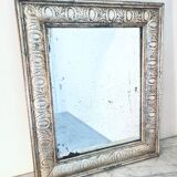 Old mercury mirror, in carved wood with silver leaf
