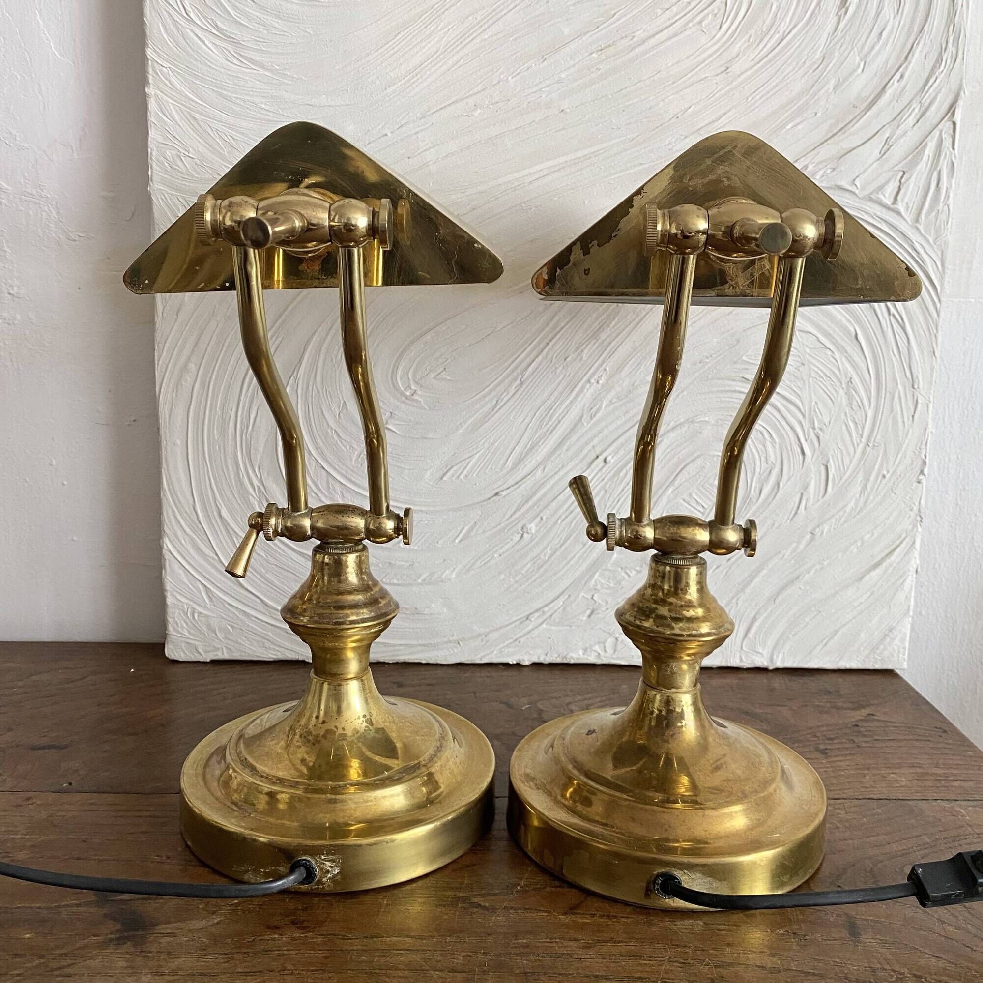 Pair of notary-style lamps in gilded metal