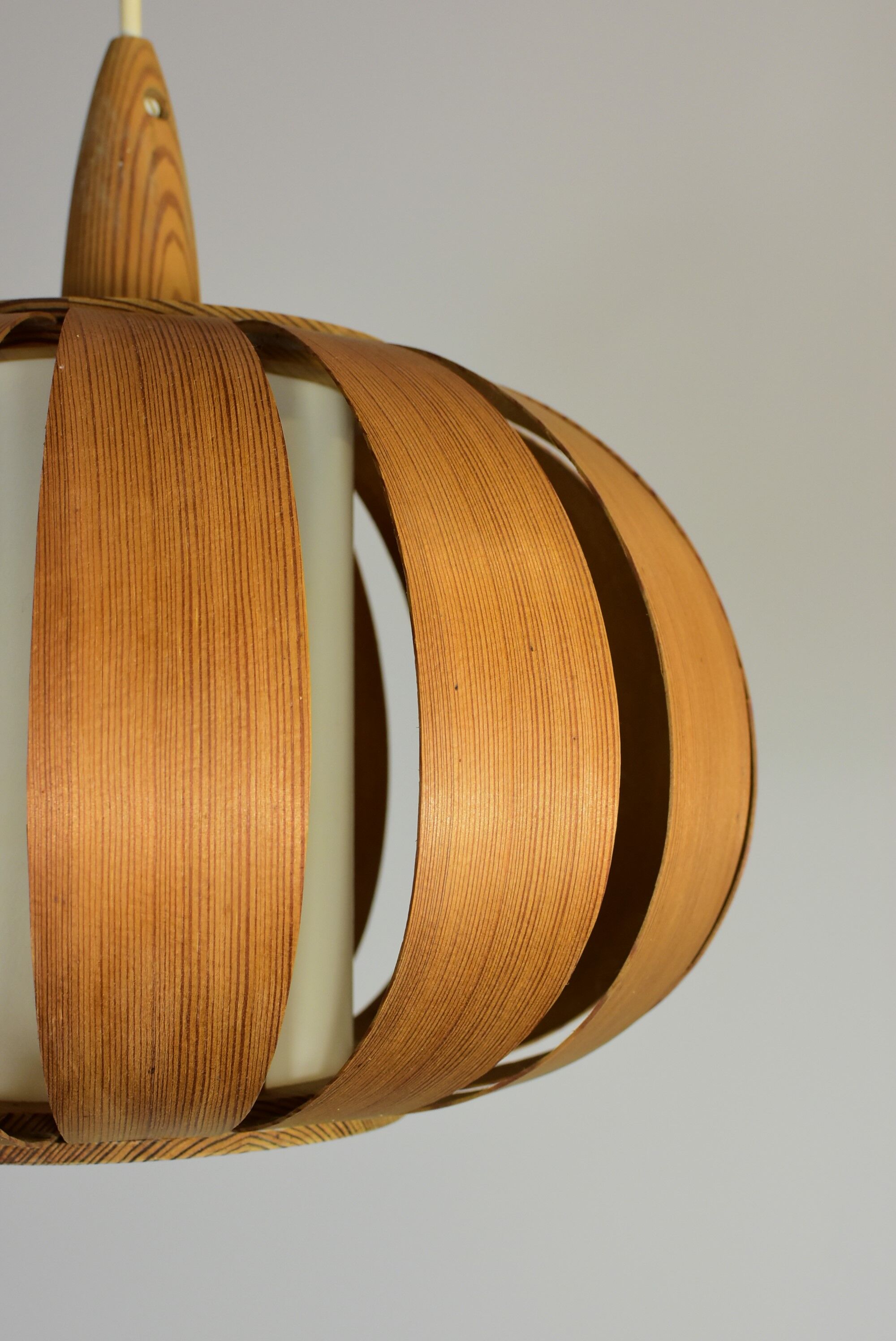 Scandinavian-style wooden pendant light.