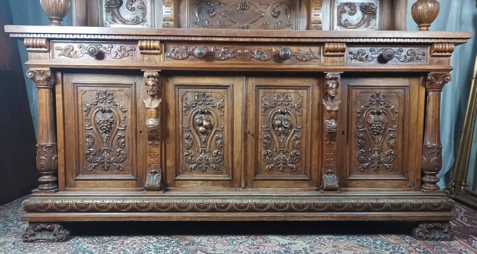 19th-century walnut buffet with two bodies.