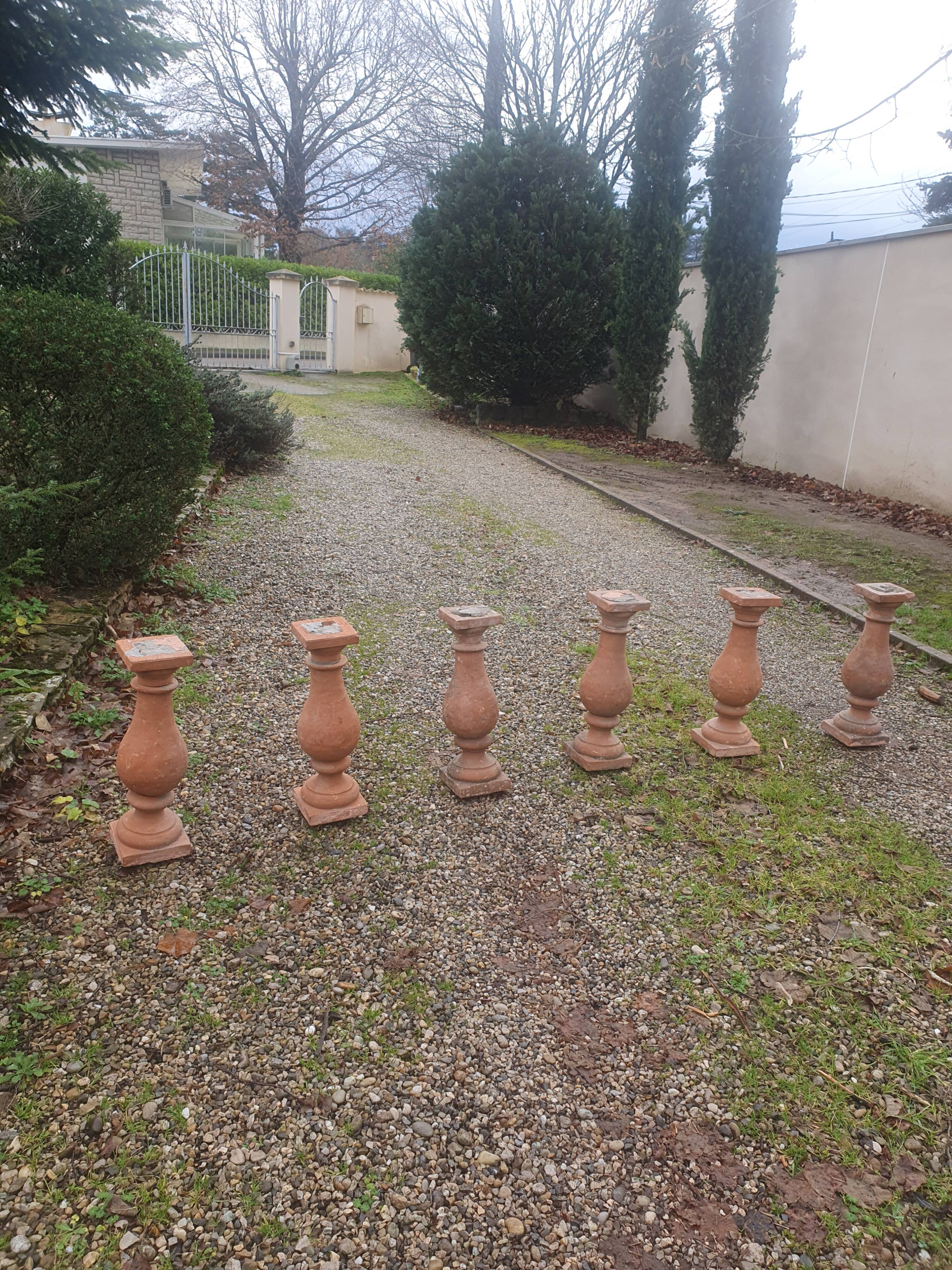About twenty terracotta balusters from Castelnaudary