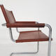 Tubular dining chair with arm rests, 1970's