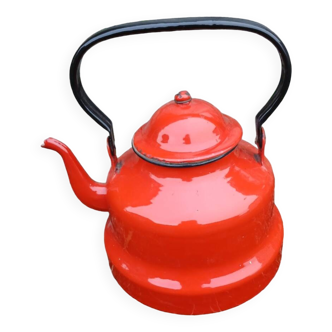Antique teapot in red enamelled sheet metal