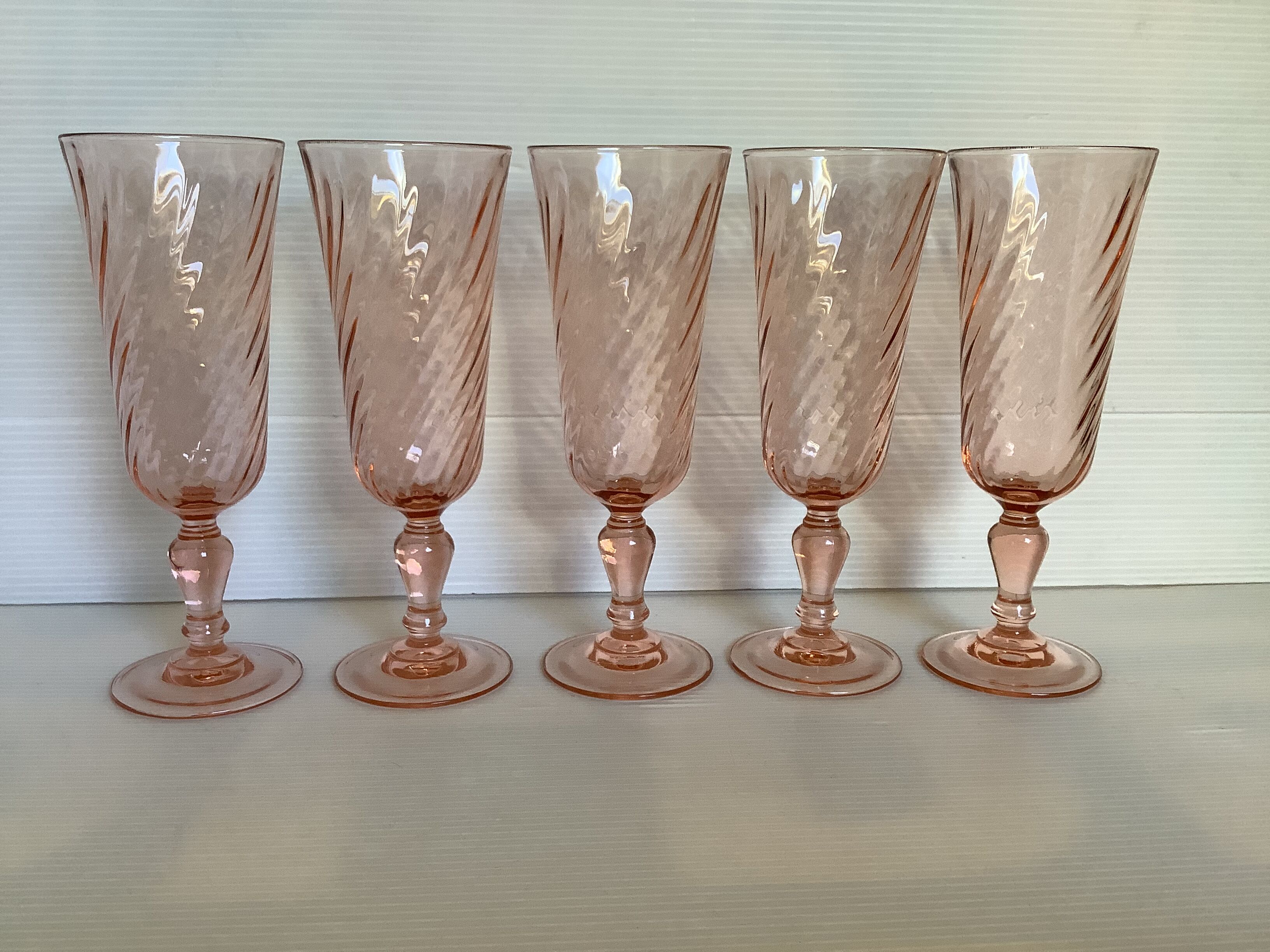 Five pink glass flutes model rosaline