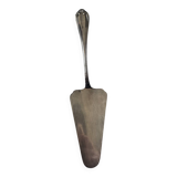 Silver metal cake peeler.