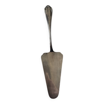 Silver metal cake peeler.