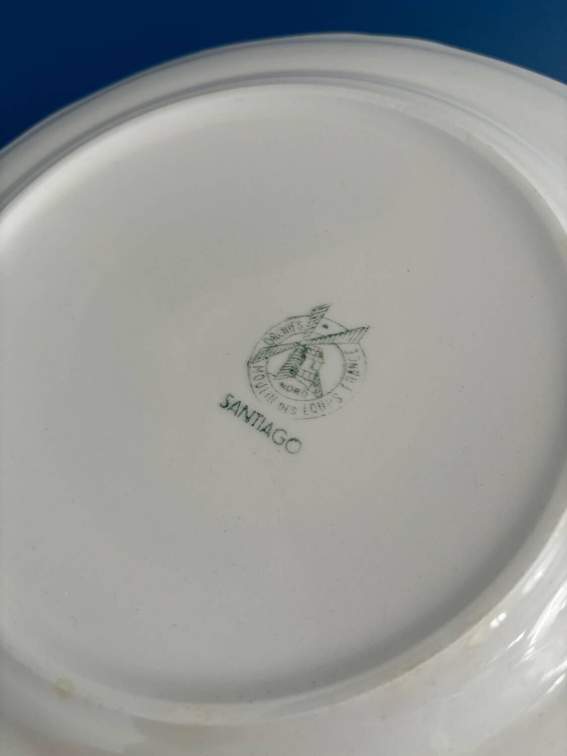 Flat plate decorated with the Moulin des Loups countryside