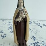 Antique statue of Saint Therese of Lisieux, religious plaster figurine
