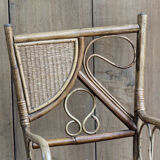 Asymmetrical rattan armchair