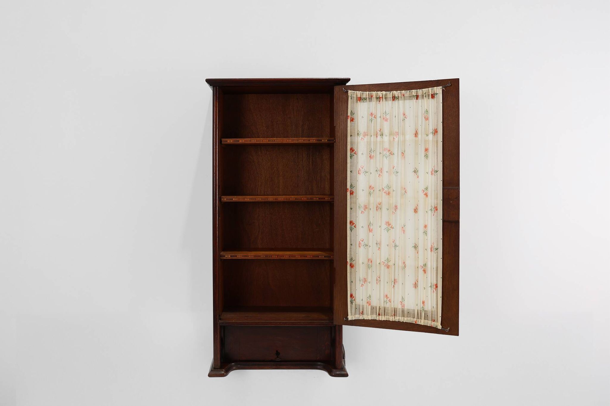 French Art Deco tall cabinet with glass door and hidden compartiment, ca. 1