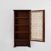French Art Deco tall cabinet with glass door and hidden compartiment, ca. 1