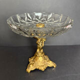 Antique crystal bowl on a bronze stand.