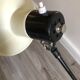 Desk lamp has two articulated metal arms