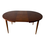 Scandinavian design extendable round table in teak, Danish manufacture.