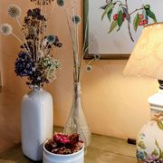 Frosted transparent glass carafe with raised cherry and grape patterns.