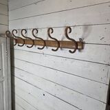 Curved wooden coat rack with 6 hooks