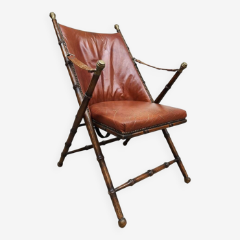 Fauteuil pliant vintage en simili cuir et faux bambou, style Safari