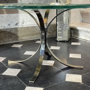 Pair of round coffee tables, glass, ca 1970