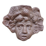 Child's face sculpture