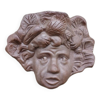 Child's face sculpture