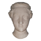 Antique plaster face of a woman