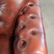 Brown cow leather Chesterfield armchair in a unique design