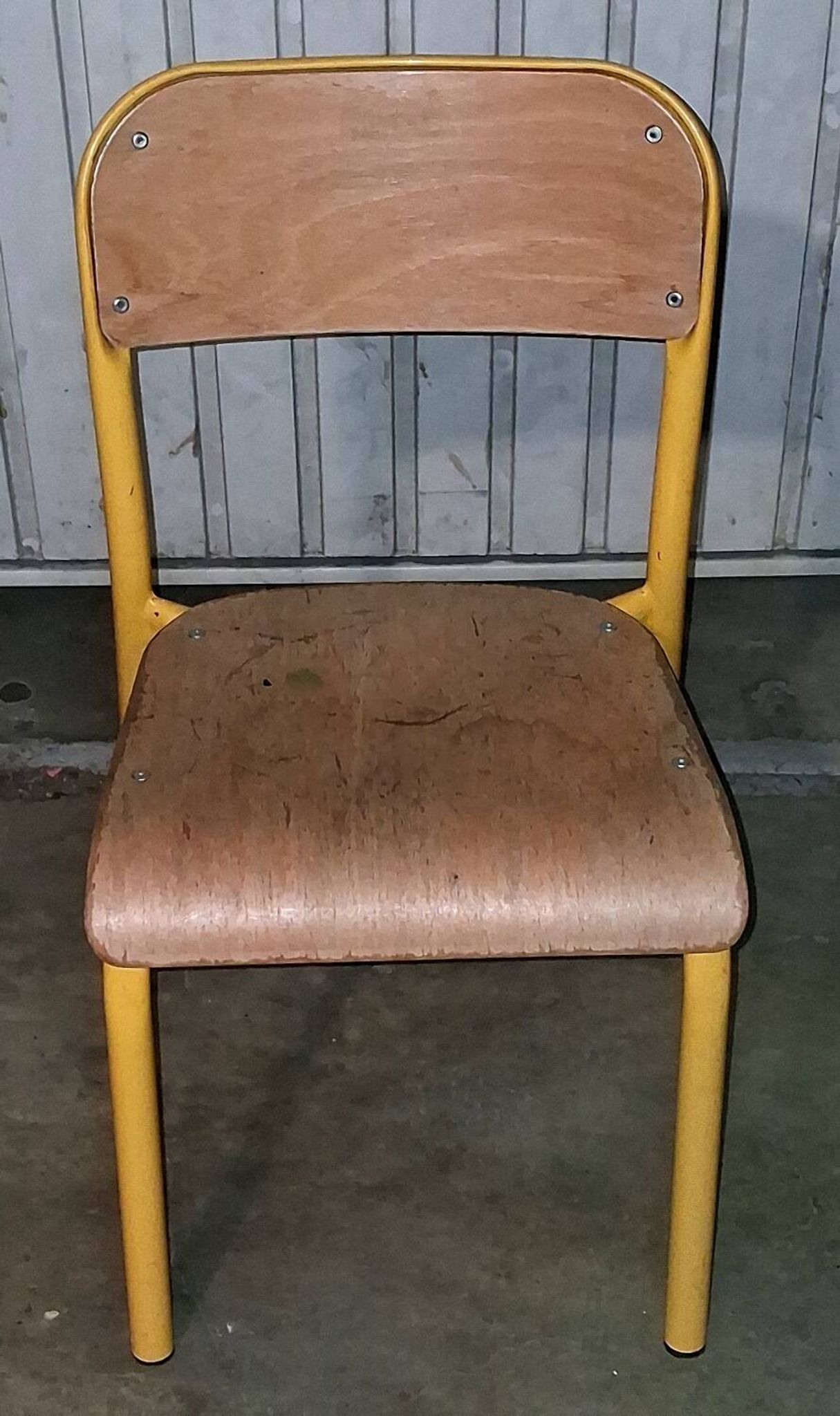 Pair of school chairs, wood and yellow metal, industrial decor.