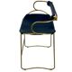 Contemporary kitchen bar stool with brass metal backrest and navy blue leather.
