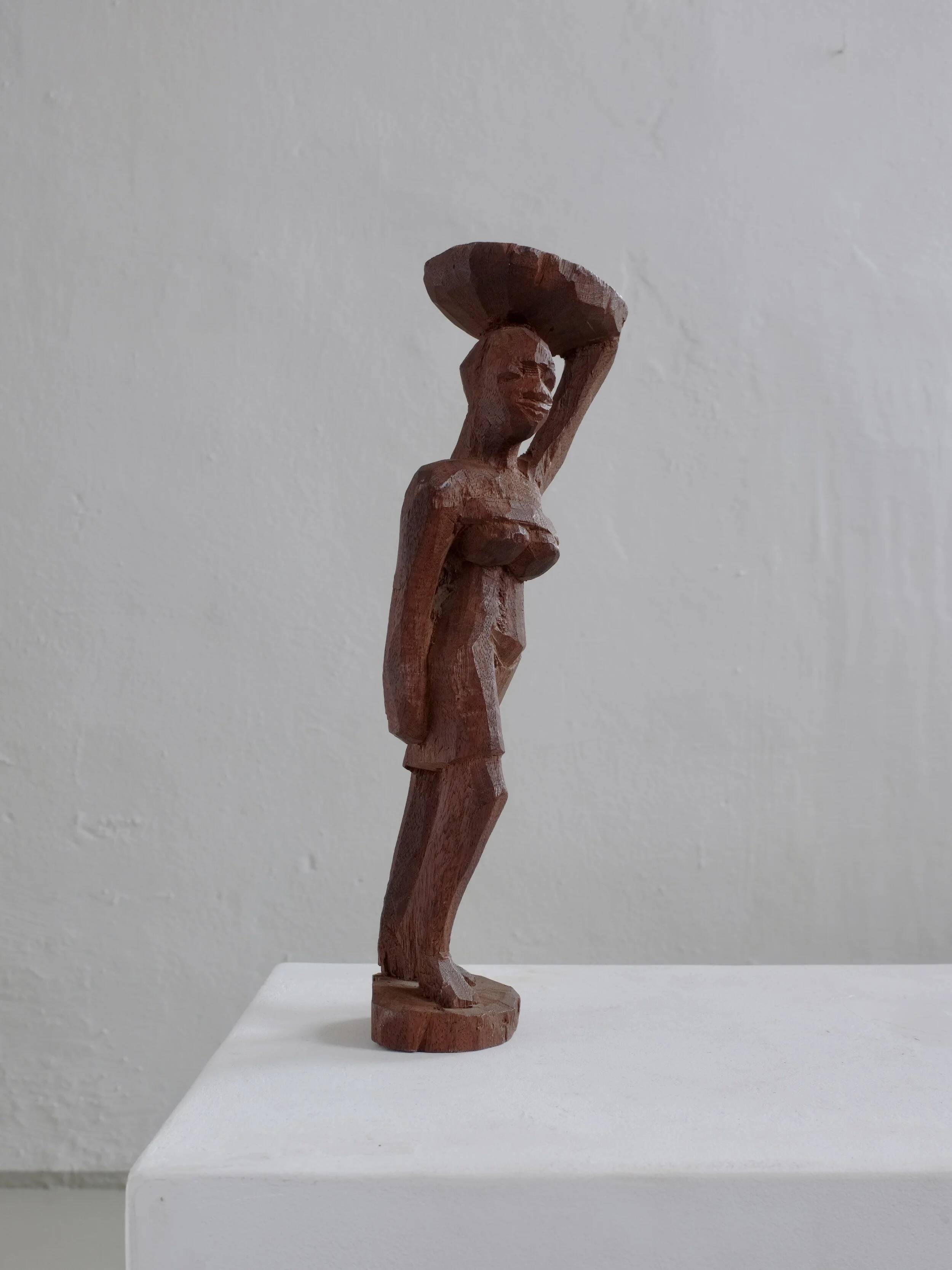 Mid-century hand-carved African woman sculpture