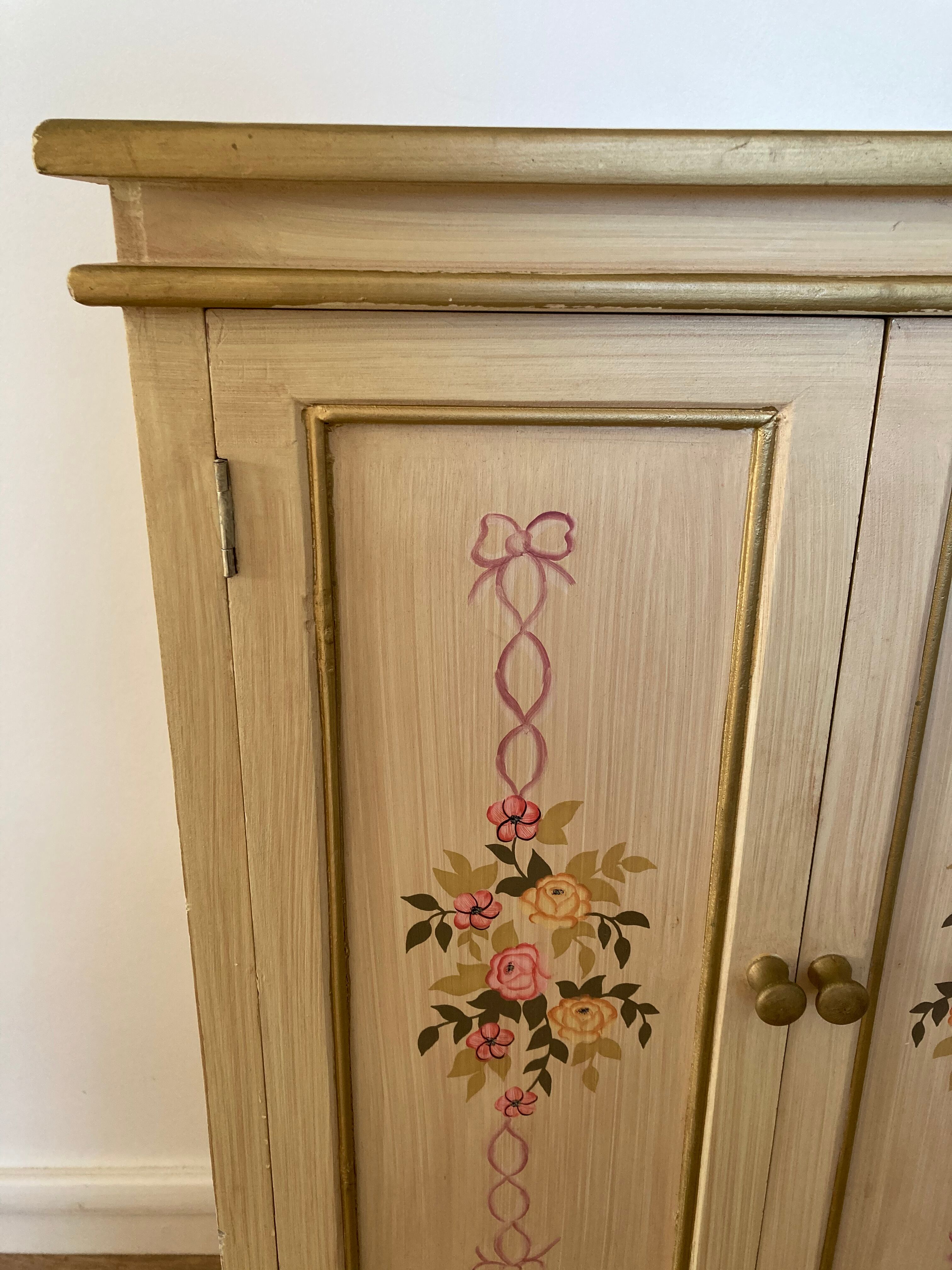 2-door flowered wooden cabinet