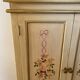 2-door flowered wooden cabinet